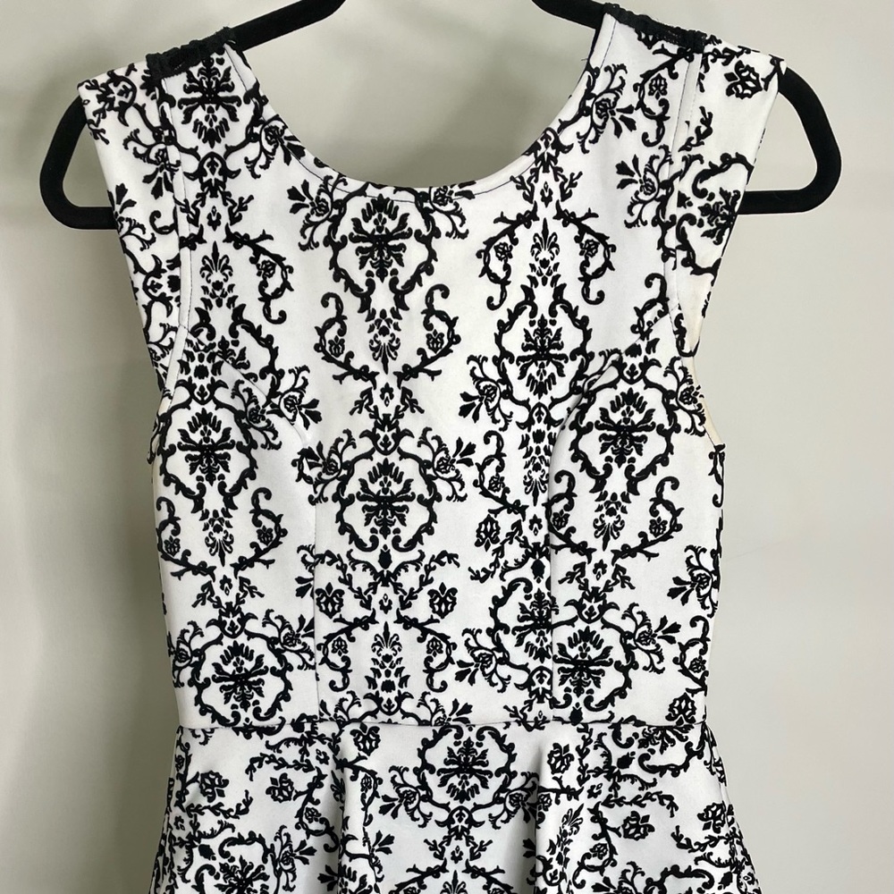 Peplum dress black and white